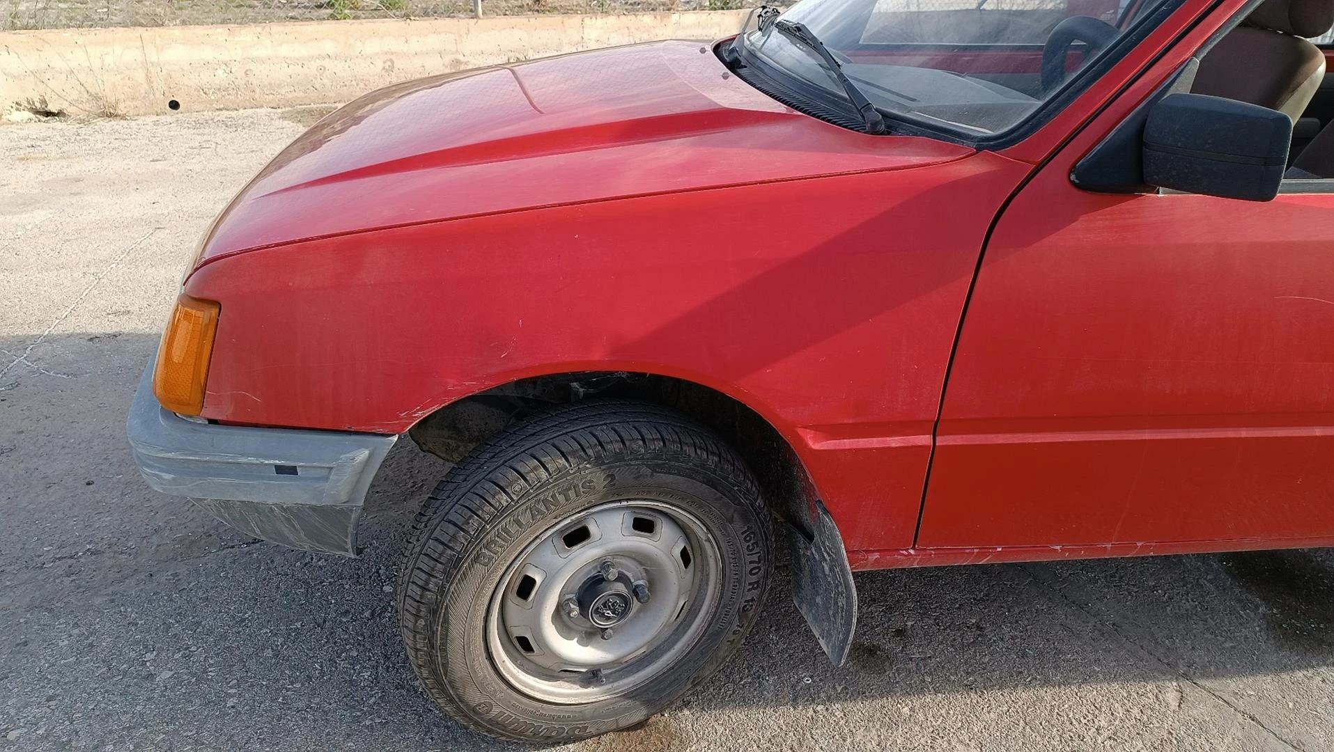 GUARDA-LAMAS FRENTE ESQUERDO PEUGEOT 205 II