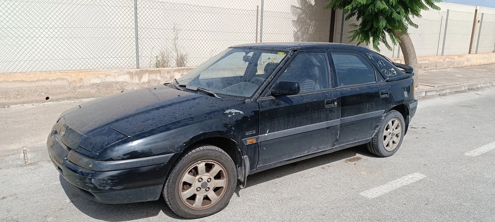 FECHADURA PORTA FRENTE ESQUERDA MAZDA 323 C IV