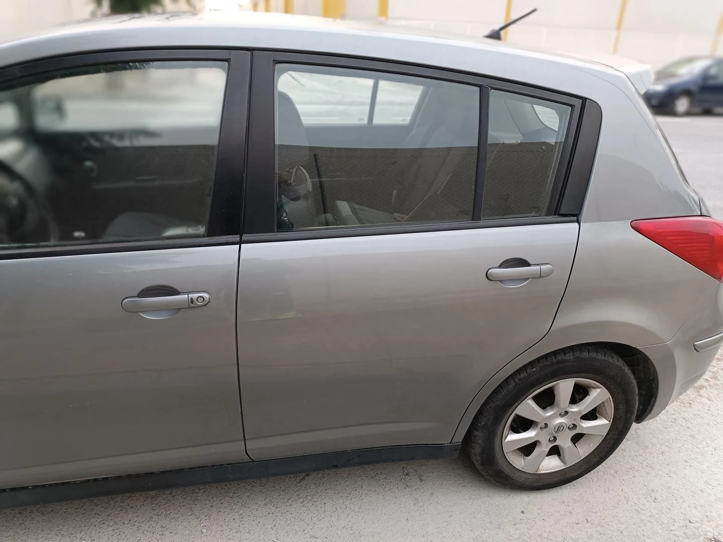 ELEVADOR TRASEIRO ESQUERDO NISSAN TIIDA SEDÁN