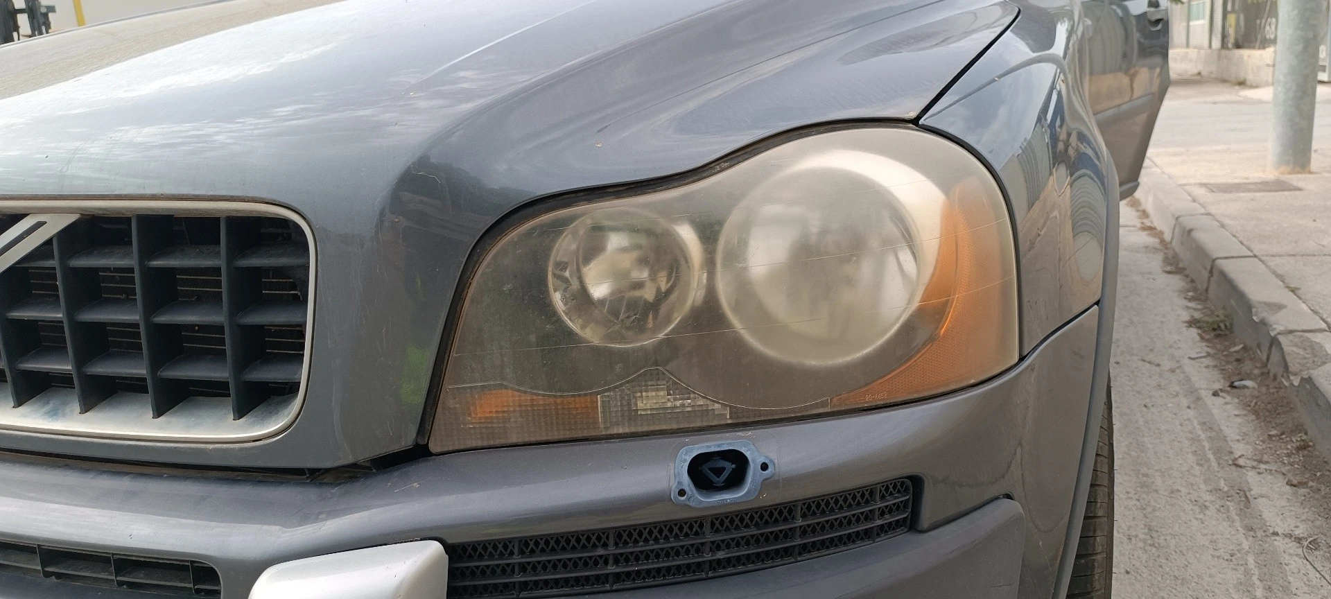 FAROL ESQUERDO VOLVO XC90 I