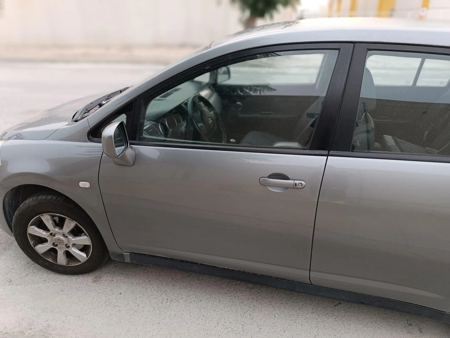 ELEVADOR FRENTE ESQUERDO NISSAN TIIDA SEDÁN