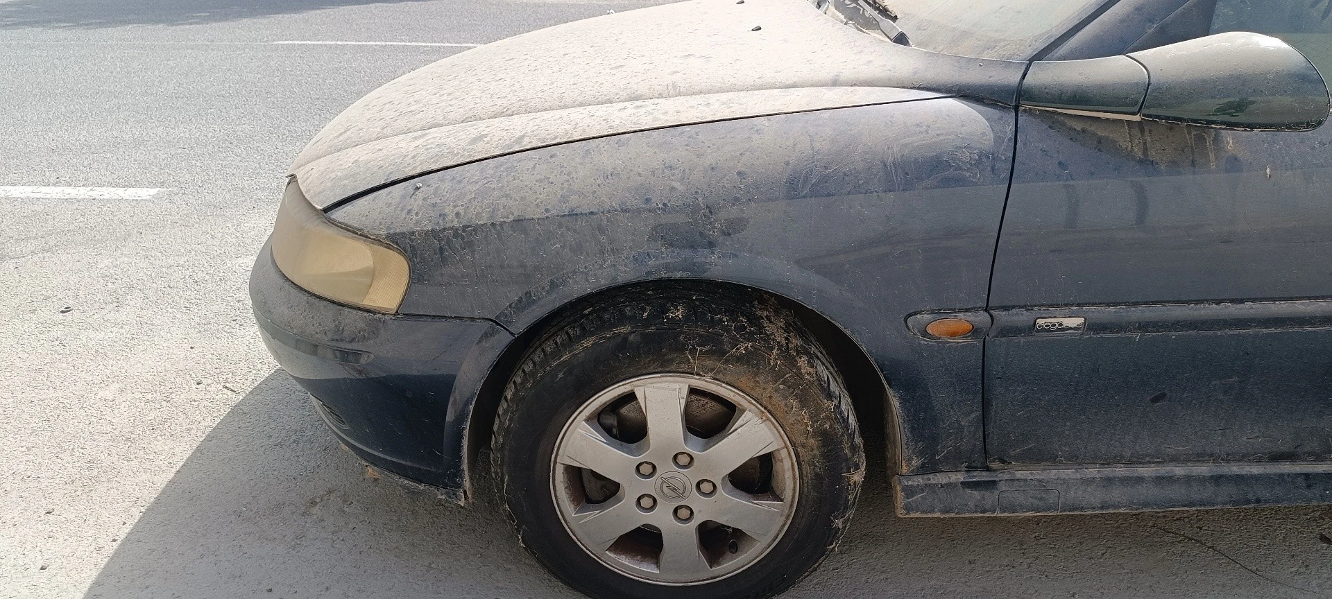 GUARDA-LAMAS FRENTE ESQUERDO OPEL VECTRA B