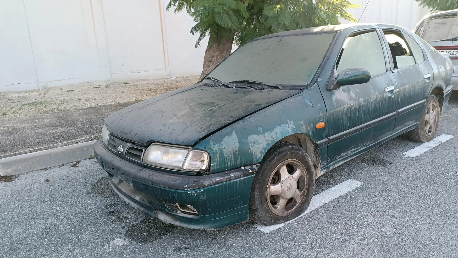 FECHADURA PORTA TRASEIRA ESQUERDA NISSAN PRIMERA