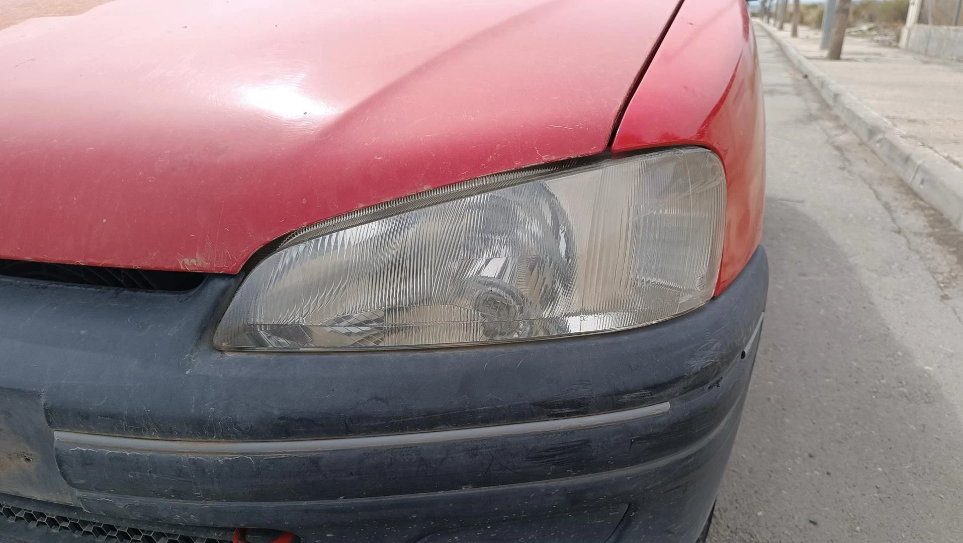 FAROL ESQUERDO PEUGEOT 106 II