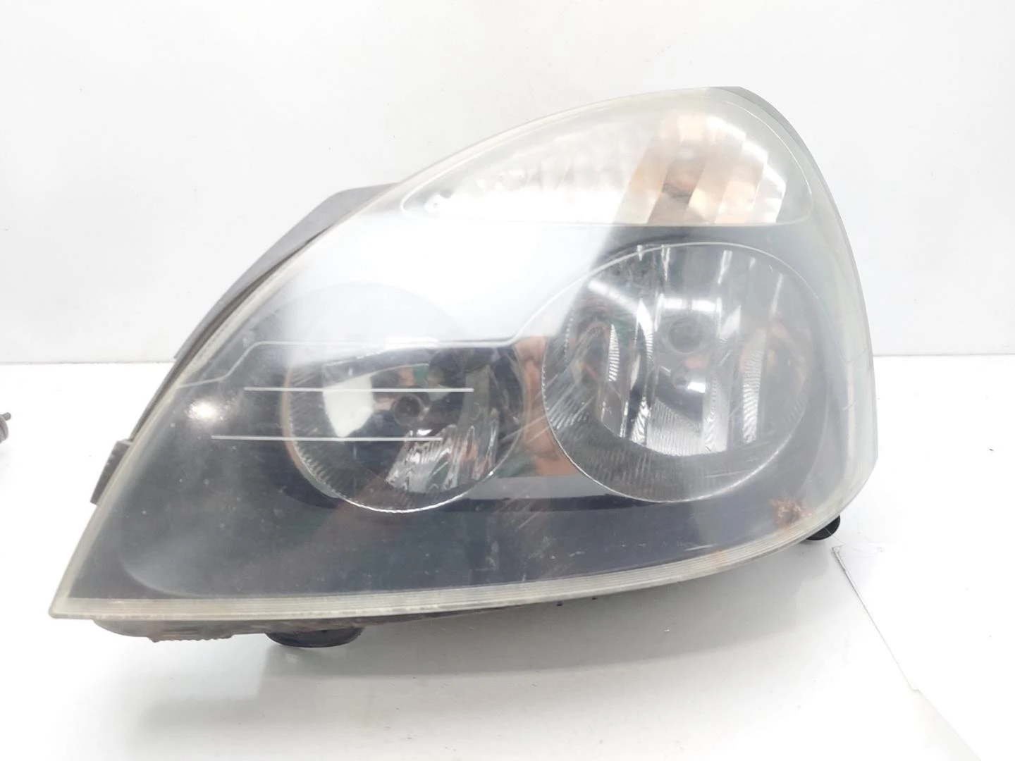 FAROL ESQUERDO RENAULT CLIO II