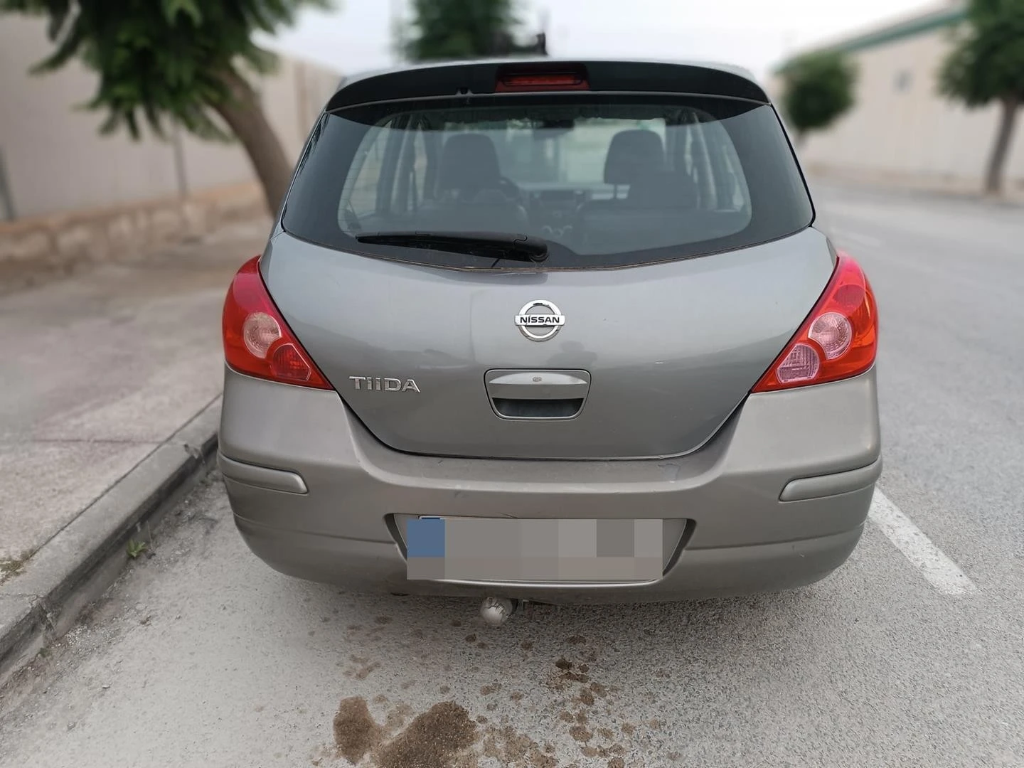 MALA TRASEIRA NISSAN TIIDA SEDÁN