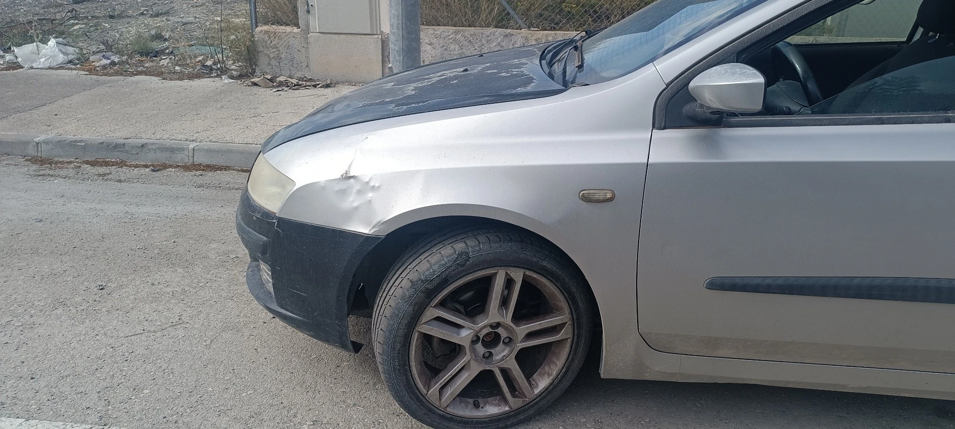 GUARDA-LAMAS FRENTE ESQUERDO FIAT STILO