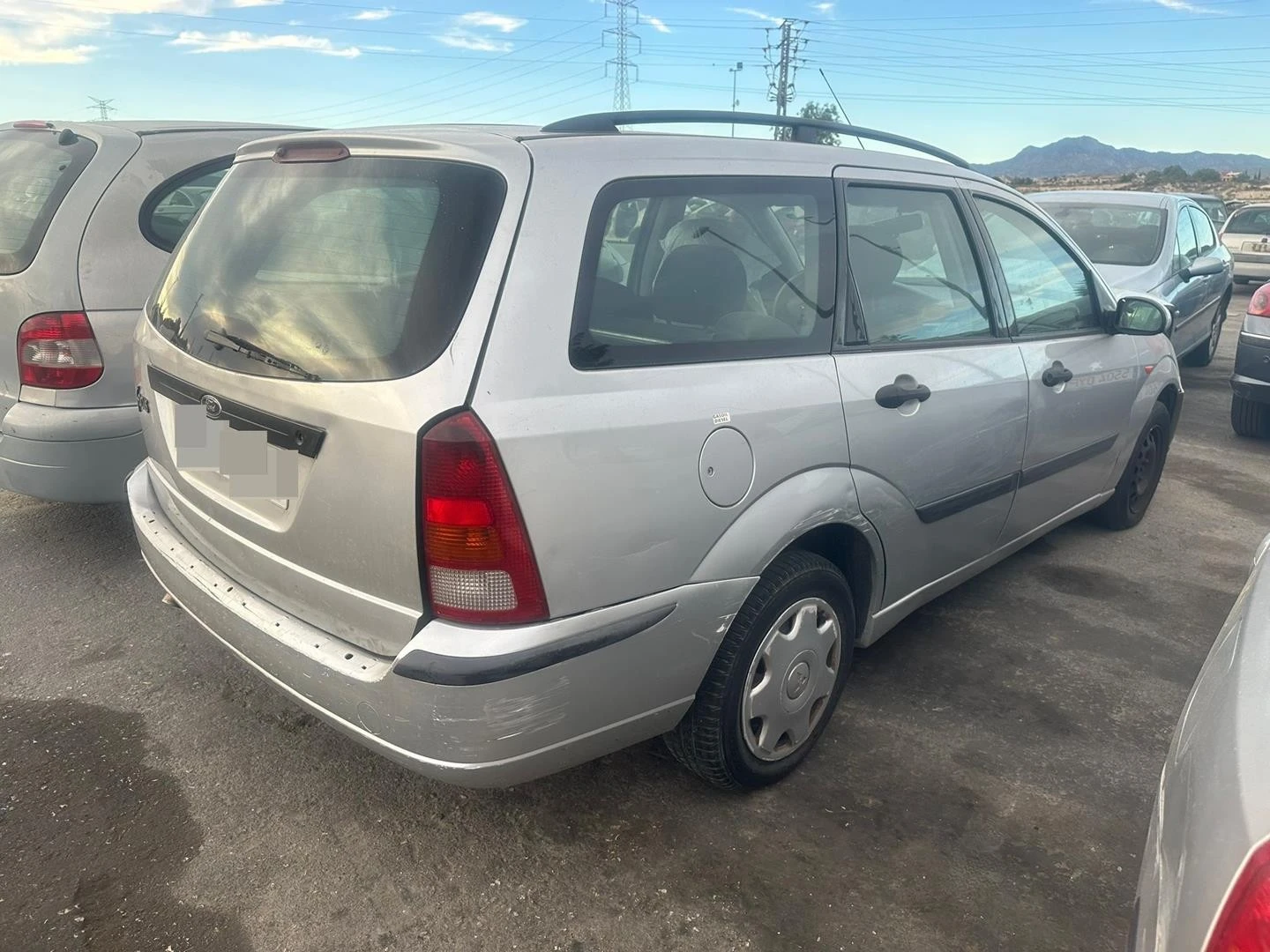 FECHADURA PORTA TRASEIRA ESQUERDA FORD FOCUS TURNIER