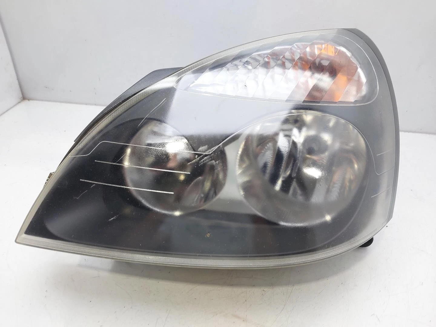 FAROL ESQUERDO RENAULT CLIO II