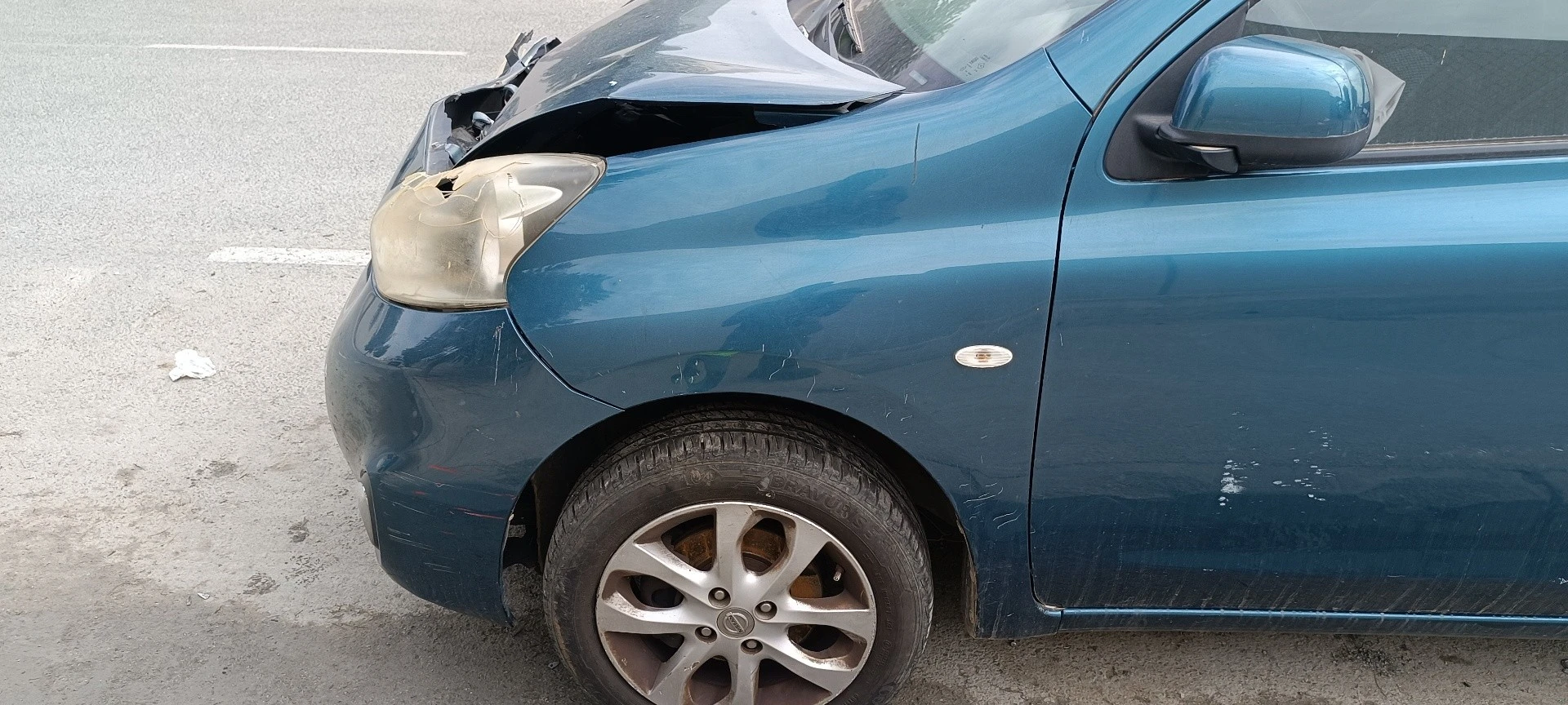 GUARDA-LAMAS FRENTE ESQUERDO NISSAN MICRA IV